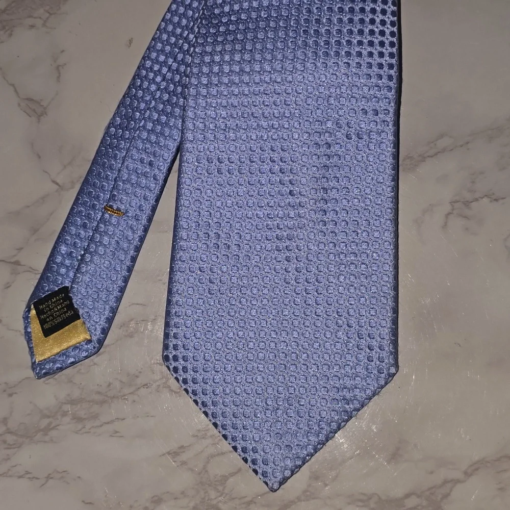 Sophisticated Light Blue Textured Tie By Donald Trump
